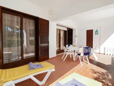 a living room with a table and chairs at Apartment Joyce - Sunny Way by Interhome in Albufeira