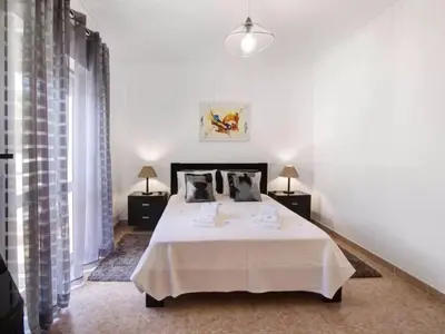 a bedroom with two beds and a window at Apartment Kaya- Sunny Way by Interhome in Albufeira