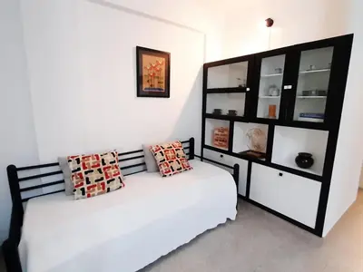 a bedroom with a bed with two pillows on it at Apartment Kaya- Sunny Way by Interhome in Albufeira