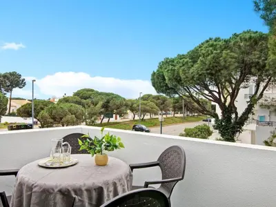 a living room with a couch and a fireplace at Apartment Medusa - Sunny Way by Interhome in Albufeira