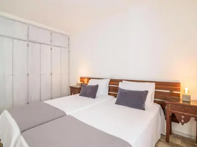 a living room with a couch and a table at Apartment Patrick - Sunny Way by Interhome in Albufeira