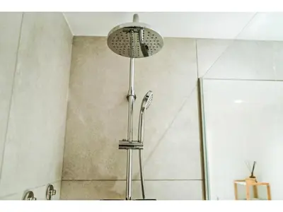 a shower with a shower head in a bathroom at Apartment Sunlight Albufeira - Sunny Way by Interhome in Albufeira