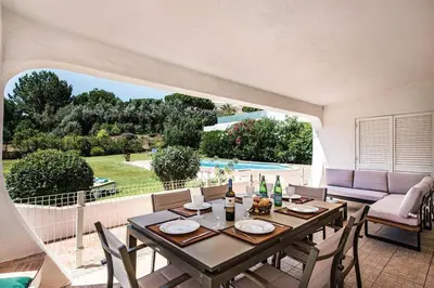 an aerial view of a house with a swimming pool at 4 Beds, Golf Views, optional pool heating in Vilamoura