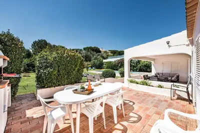an aerial view of a villa with a swimming pool at 4 Beds, Golf Views, optional pool heating in Vilamoura