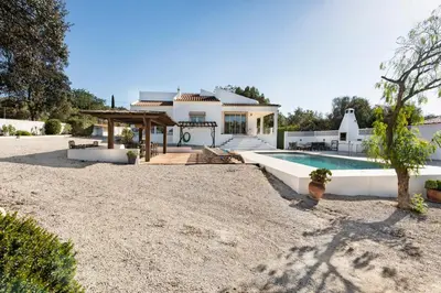 an aerial view of a house with a swimming pool at Lovely Vacation Villa In Loulé in Loulé