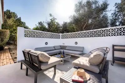 a swimming pool in the backyard of a house at Lovely Vacation Villa In Loulé in Loulé