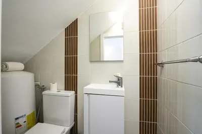 a bathroom with a toilet and a sink at Marina Búzios I & II - Vilamoura Marina by HD in Vilamoura