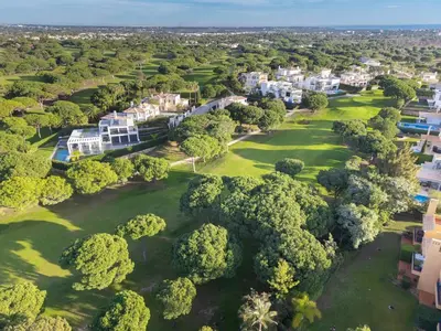 an aerial view of a park with trees and houses at F5 Vila Sol G Pool & Golf in Vilamoura in Quarteira