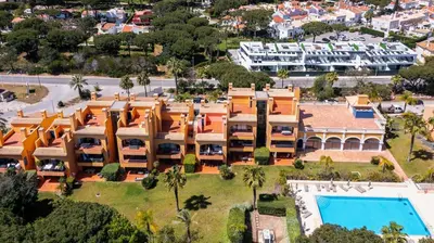 an aerial view of a resort with a swimming pool at F5 Vila Sol AI Pool & Golf in Vilamoura in Quarteira