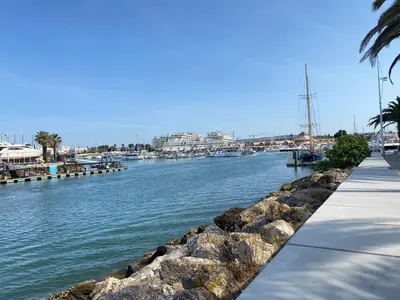 a view of a river with a marina at Solar Vilamoura Relaxing Apartment Stay in Quarteira