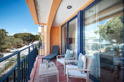 a balcony with chairs and a view of the ocean at F5 Vila Sol Q Pool & Golf in Vilamoura in Quarteira