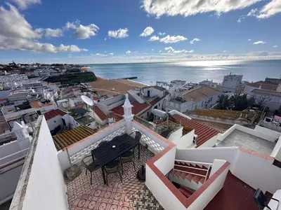 a view of a city from the roof of a building at Al-Gharb House - Vista Mar in Albufeira