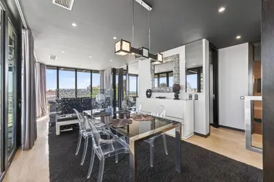 a rooftop patio with a bed on the roof at Penthouse Grand Noir in Guia