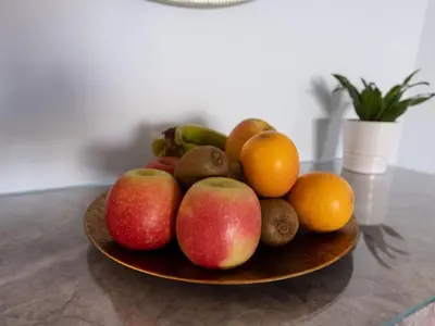 a bowl of fruit on a table at Holiday Home Aldeia Do Mar by Interhome in Vilamoura