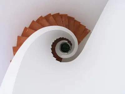 a spiral staircase with a hole in the ceiling at Holiday Home Aldeia Do Mar by Interhome in Vilamoura