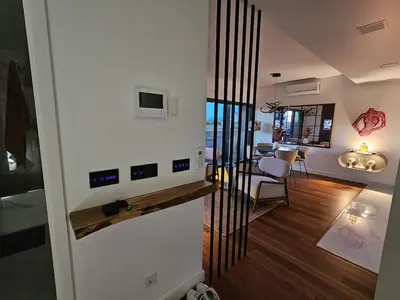 a hallway with a living room and a dining room at Apartamento Platinum in Faro