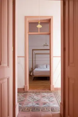 a hallway with a bed in a room at Casa 1923 by MY CHOICE in Faro