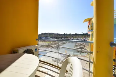a balcony with a view of a body of water at Marina Sunny Heaven TatiHomes 2 in Albufeira