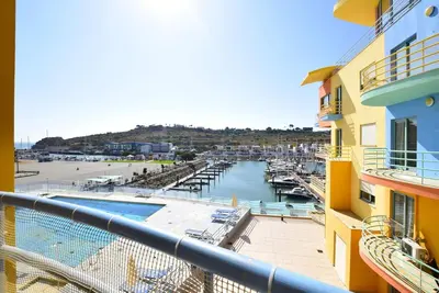 a view of a marina from the balcony of a building at Marina Sunny Heaven TatiHomes 2 in Albufeira
