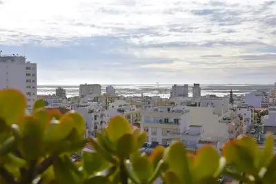 a view of a city with buildings at Blife Chelsya private apartment in Faro