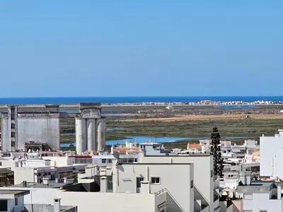 a view of a city with white buildings at Blife Chelsya private apartment in Faro