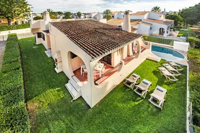 an aerial view of a house with a swimming pool at Pinhal View in Vilamoura