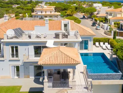 an aerial view of a house with a swimming pool at Stunning home with nice pool close to the beach in Loulé