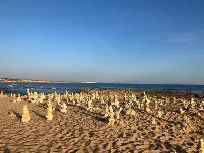 a group of sand castles on a beach at Casa Oura Praia located 100 metres from the beach in Albufeira