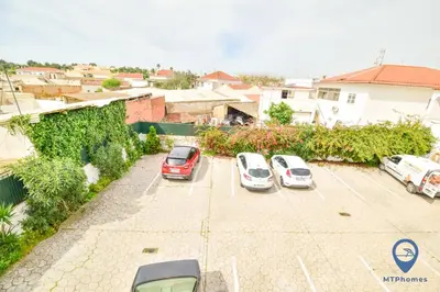 a group of cars parked in a parking lot at Eva Andorinha 5 Pax by MTPhomes in Albufeira
