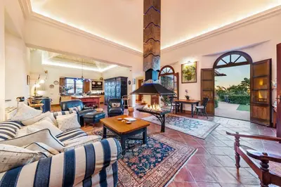 a living room with a couch and a table at Vistas Algarve in Loulé