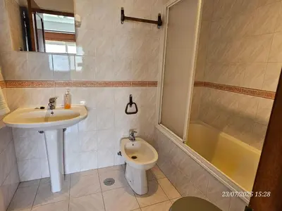a bathroom with a sink and a toilet and a shower at Blife Allya private apartment in FAO