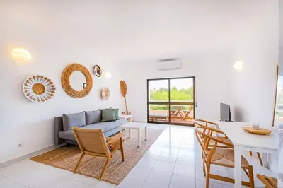 a living room with a couch and a table at Apartment Sonia in Albufeira