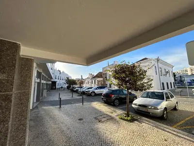 a hallway with stairs and a door in a building at 3F Bocage - Centro de Faro in Faro
