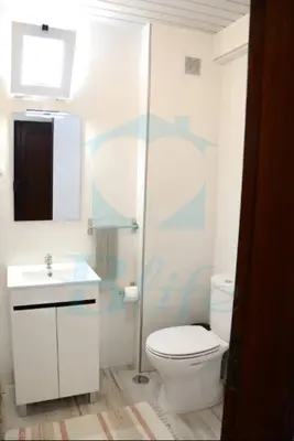 a bathroom with a toilet and a sink at Blife Julya private apartment in Faro