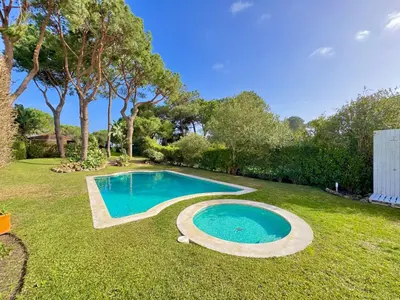 a swimming pool in the middle of a yard at Vilamoura Amazing Villa 2 With Pool by Homing in Vilamoura