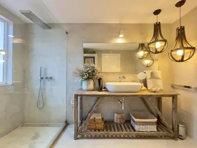 a bathroom with a sink and a shower at Vilamoura Amazing Villa 2 With Pool by Homing in Vilamoura