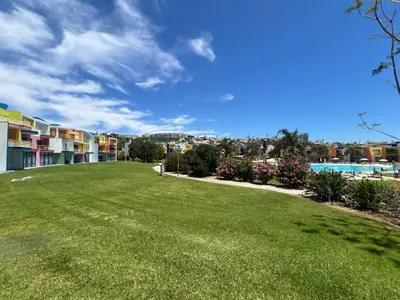 a view of a yard with a swimming pool at Marina de Albufeira - Apartamentos Turísticos da Orada in Albufeira