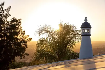a lighthouse sitting on top of a roof at Villa e5 in Tunes