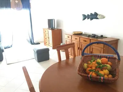 a basket of fruit sitting on top of a table at C Dreams - Comfortable and luminous apartment in Albufeira