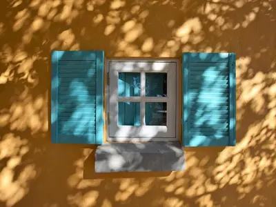 a window on the side of a building with blue shutters at Elegant Loulé Mansion with Pool in Loulé