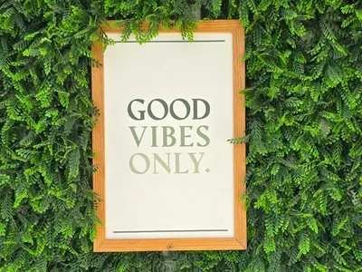a sign with good vibes only on a green wall at Villa Summertime - Private Jacuzzi and bikes, beach 800m in Albufeira
