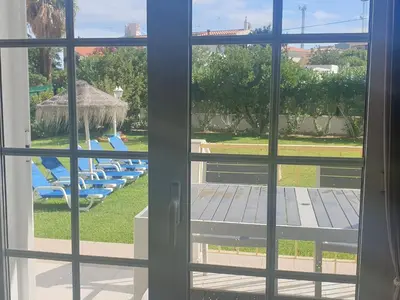 a view of a pool from a window at Villa Summertime - Private Jacuzzi and bikes, beach 800m in Albufeira