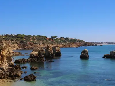 a river with some rocks in the water at Villa Quinta do Algarve in Albufeira