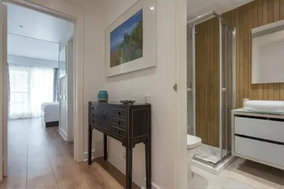a bathroom with a sink and a toilet at Blue&Greens Apartment in Quinta do Lago