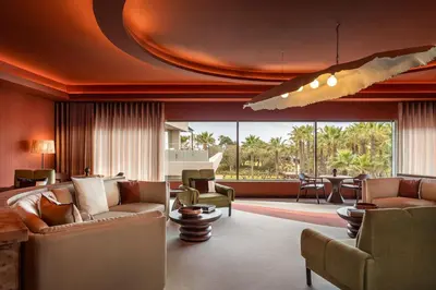 a bathroom with a round sink and a mirror at Kimpton Atlantico Algarve by IHG in Albufeira