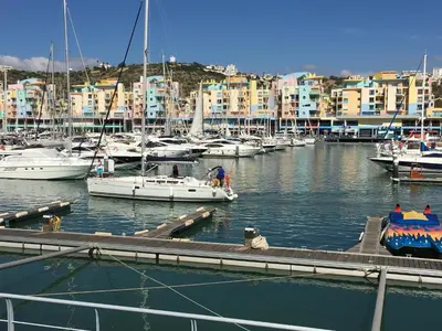 a marina with boats in the water and buildings at Villa AcquaMarina - 5 bedroom, water front villa in Albufeira