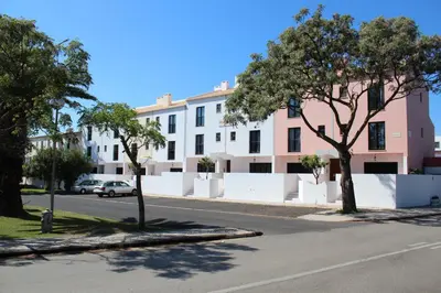 a bedroom with a large bed and a lamp at Mouraliz Apartments by HD PROPERTIES - Vilamoura Marina in Vilamoura
