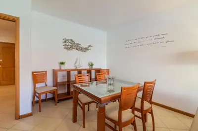 a dining room with a table and chairs at Jardins Santa Eulalia by Garvetur in Albufeira