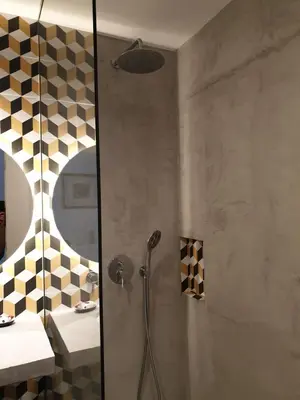 a shower with a glass door in a bathroom at Quinta Do Romão in Vilamoura
