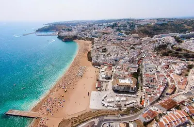 an aerial view of a beach and the ocean at Deluxe Apartment E in Albufeira